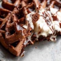 Dark Chocolate Cake Waffles are rich and decadent, chocolate cake transformed into waffles! Perfect for breakfast or dessert with no complicated steps! | https://cafedelites.com