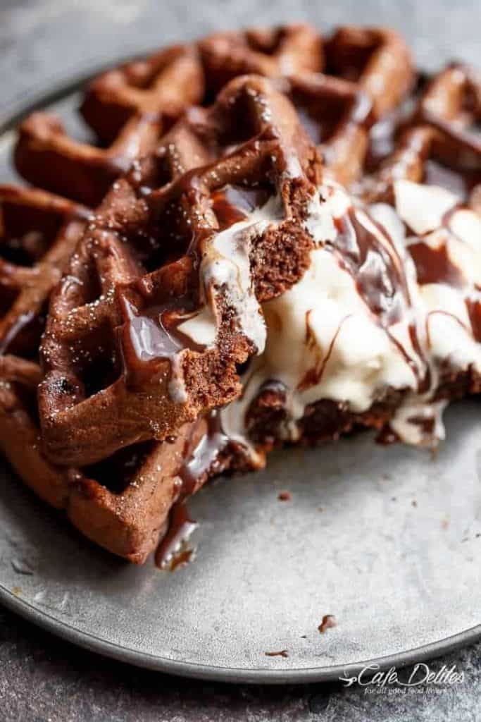 Dark Chocolate Cake Waffles are rich and decadent, chocolate cake transformed into waffles! Perfect for breakfast or dessert with no complicated steps! | https://cafedelites.com