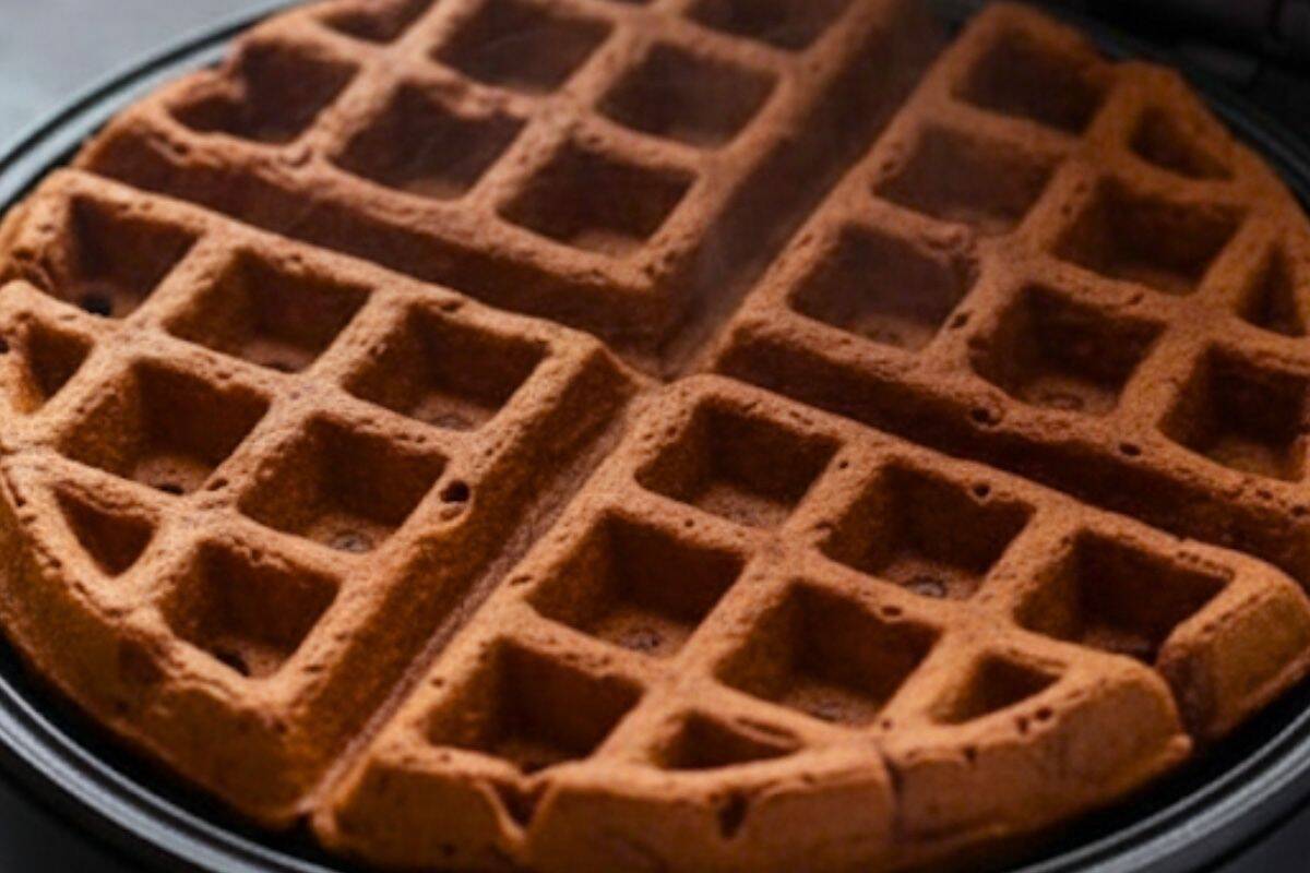 Preheat your waffle iron and cook the batter.