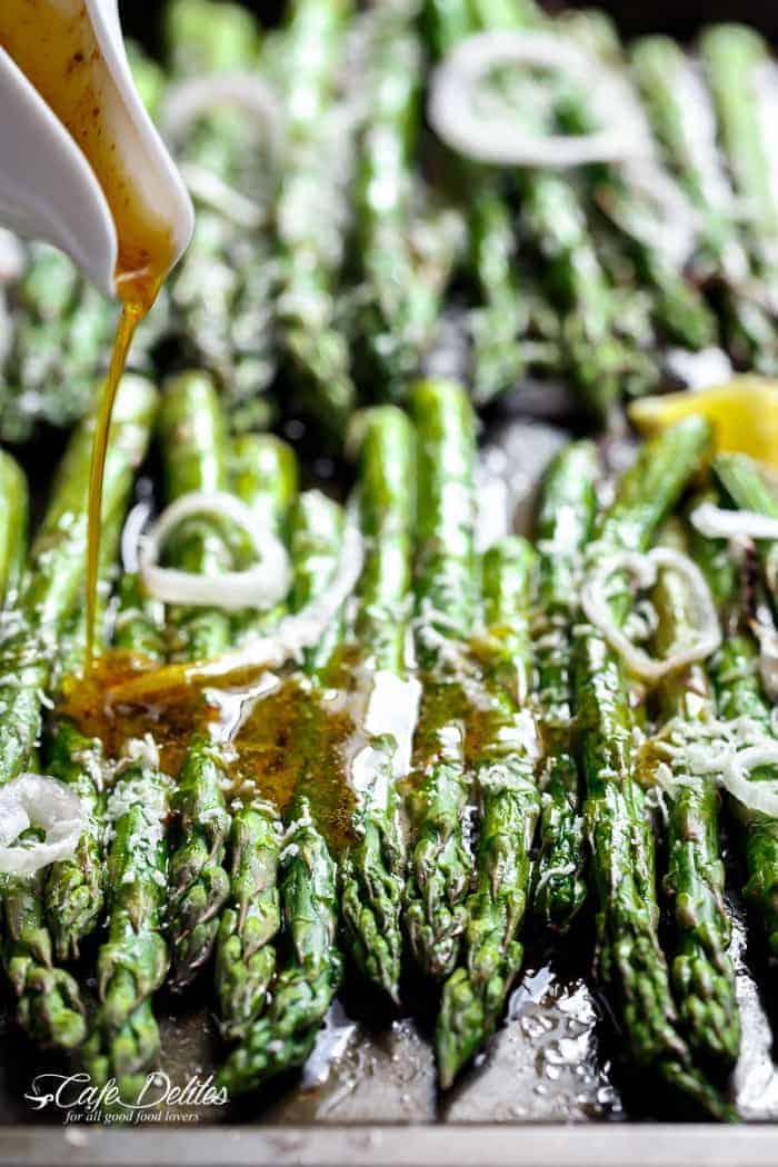 Garlic Browned Butter Baked Asparagus with Parmesan Cheese would have to be the perfect accompaniment or side dish! A delicious way to eat greens! | https://cafedelites.com