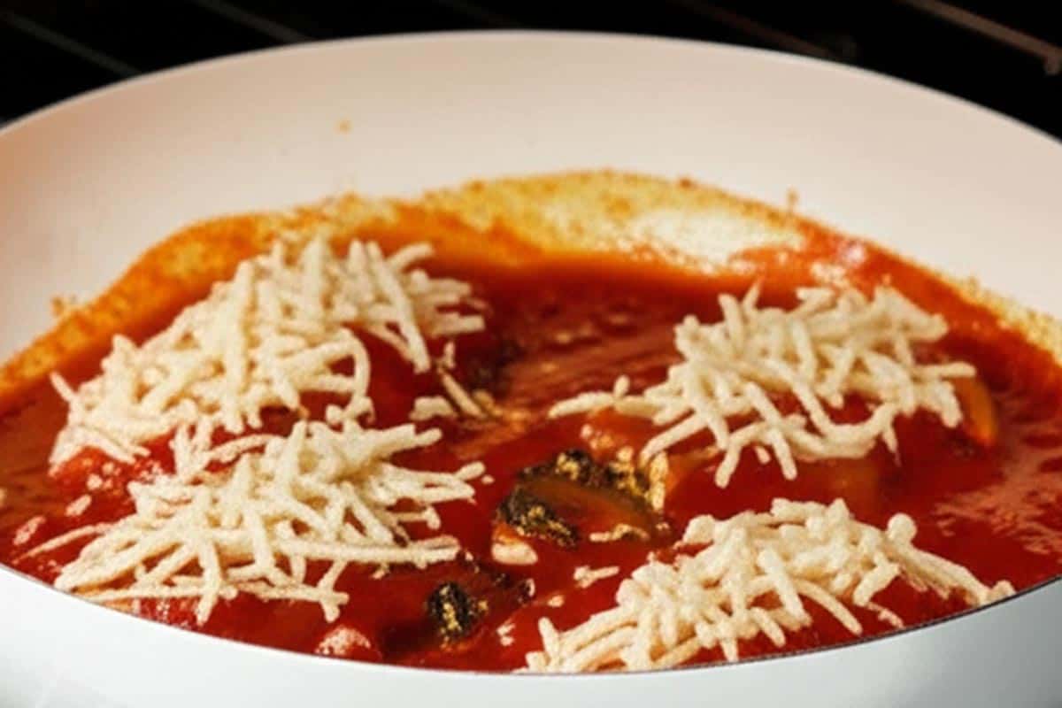 Sprinkled mozzarella over fillet.