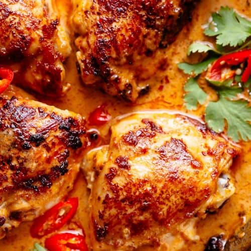 Thai Satay Chicken In A Creamy Peanut Sauce in a pan