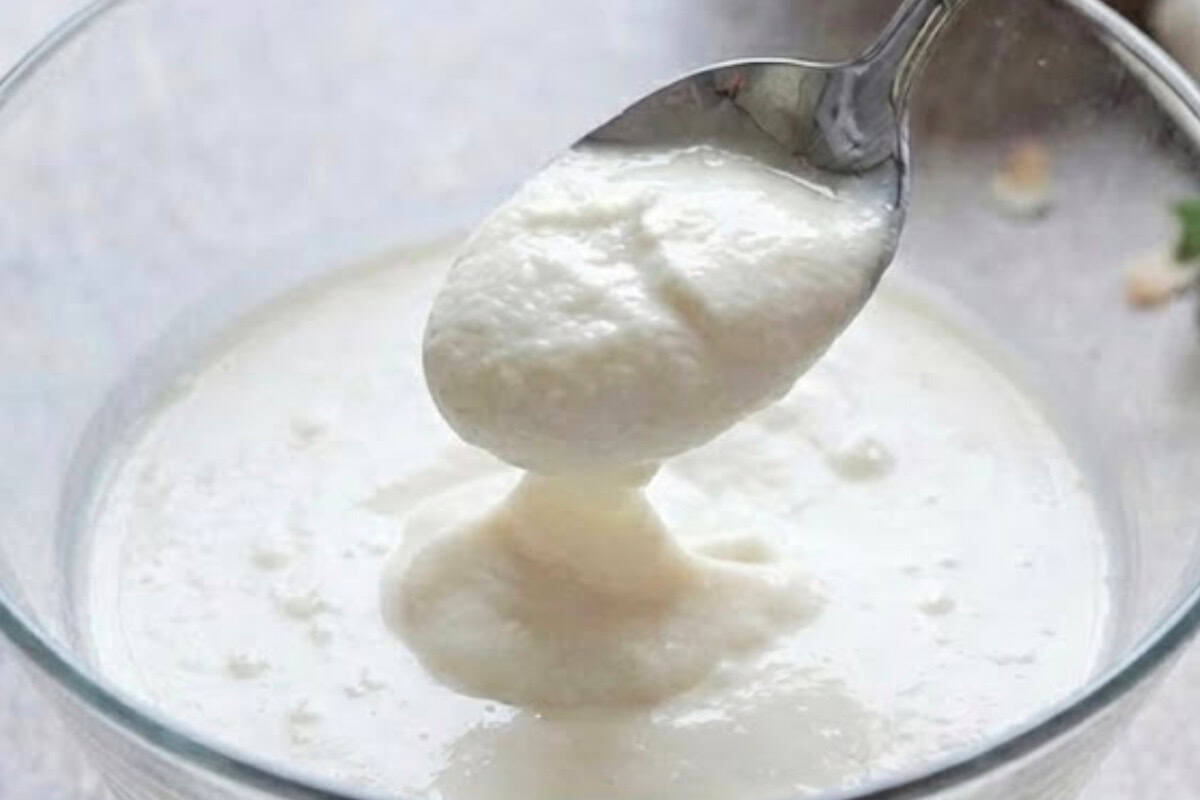 Carefully open the chilled can of coconut milk and scoop out only the thick cream from the top, leaving the liquid behind. Transfer to a mixing bowl. - 3