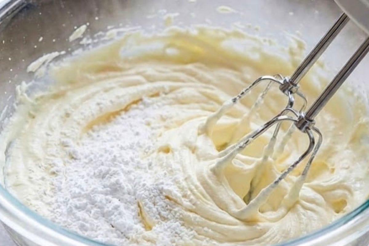 In a separate large bowl, beat the softened cream cheese and powdered sugar  - 5