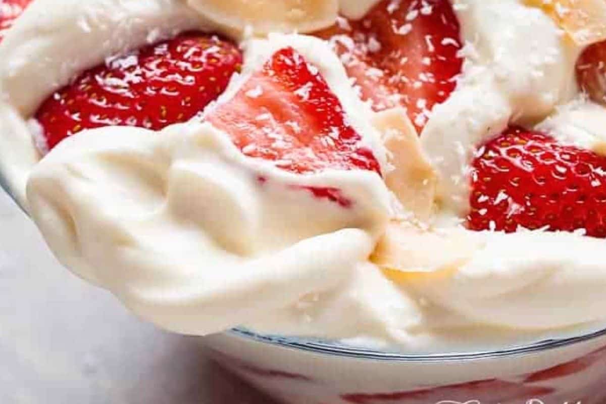 Transfer to a serving bowl and decorate with toasted coconut and extra strawberry slices if desired. - 8