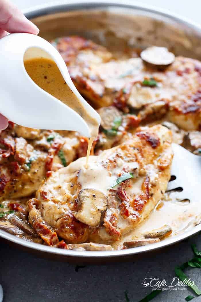 A Creamy Sun Dried Tomato Parmesan Chicken with Mushrooms that is Gluten Free and made with NO HEAVY CREAM.....or ANY cream.....at ALL! | https://cafedelites.com