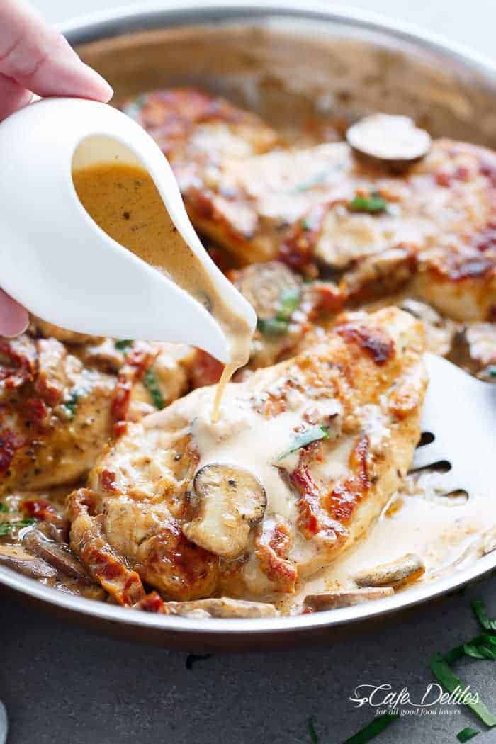 A Creamy Sun Dried Tomato Parmesan Chicken with Mushrooms that is Gluten Free and made with NO HEAVY CREAM.....or ANY cream.....at ALL! | https://cafedelites.com