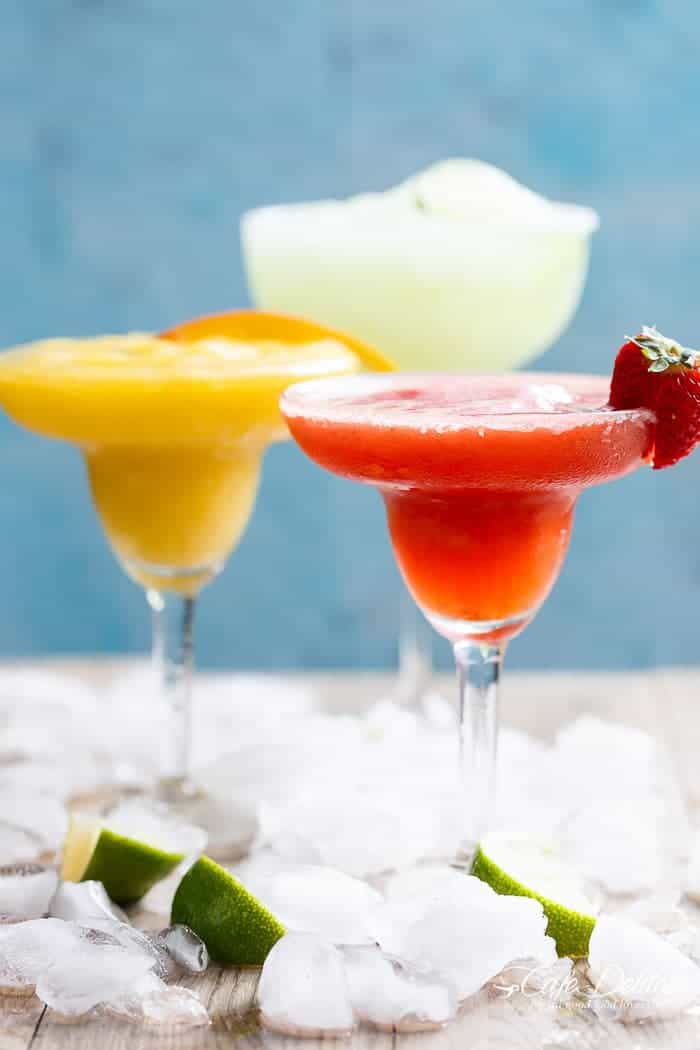 Frozen Strawberry and Mango Margaritas are refreshing and fruity and even better than the original Margarita! Celebrate in style! | https://cafedelites.com