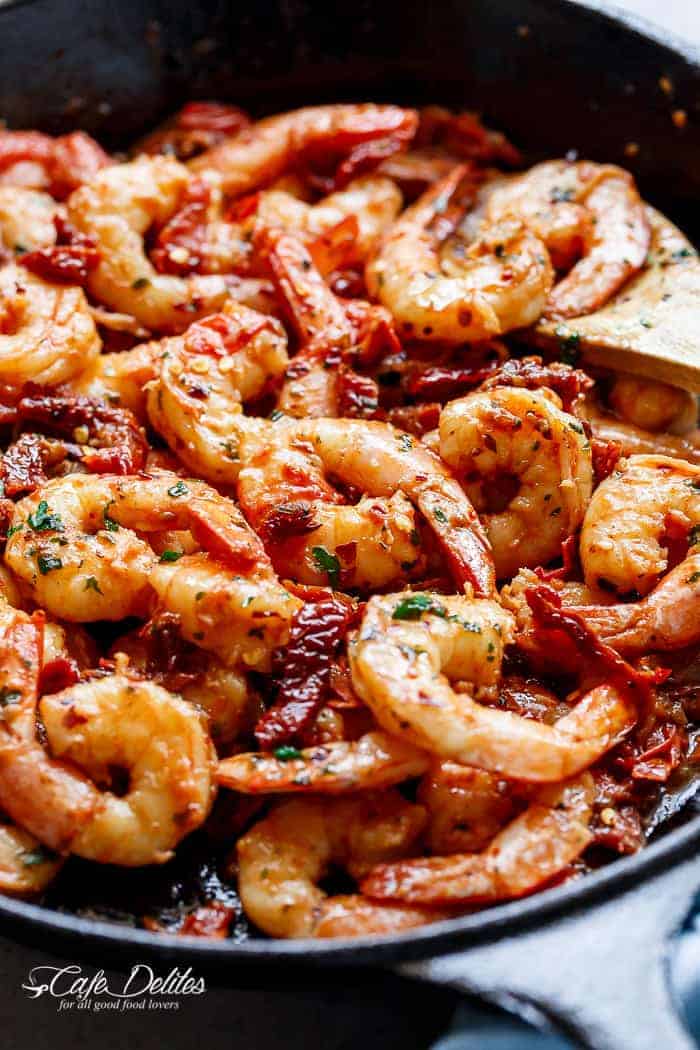 This Spicy Garlic Sun Dried Tomato Shrimp recipe came and knocked me over the head while I Spicy Garlic Sun Dried Tomato Shrimp