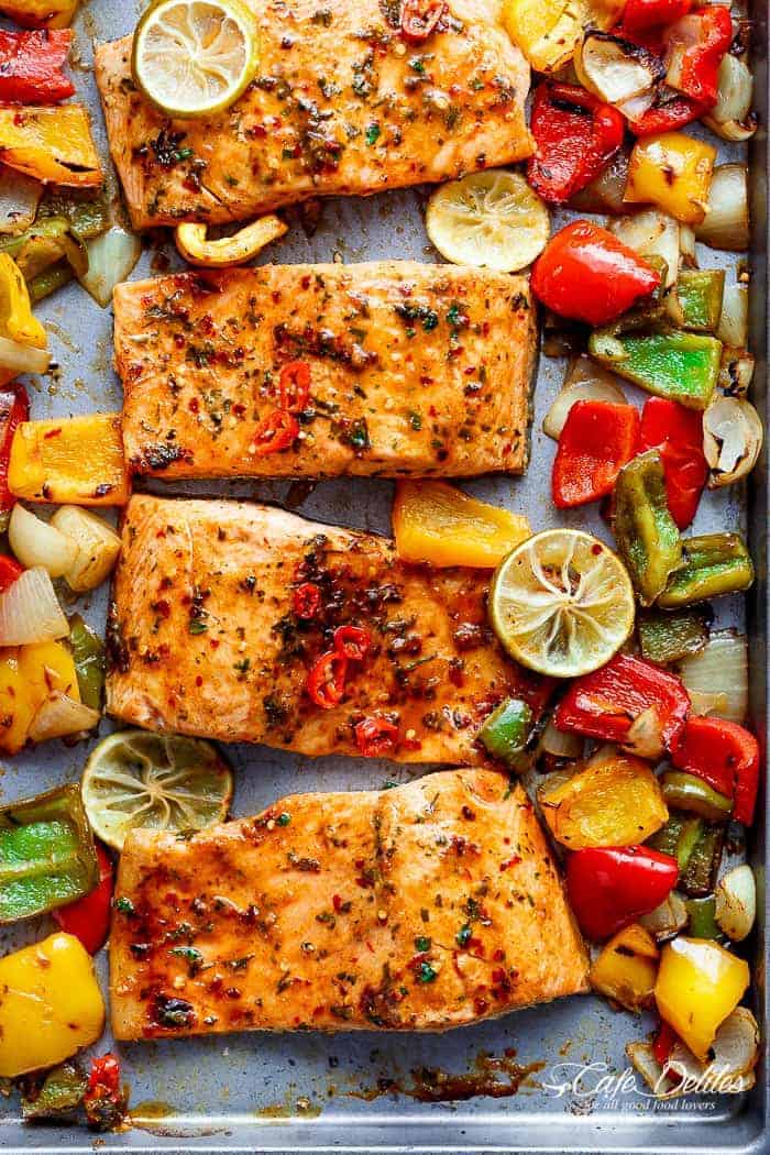 Sheet Pan Chili Lime Salmon with Fajita flavours, and a charred, crispy roasted trio of peppers for an easy and healthy weeknight meal! | https://cafedelites.com