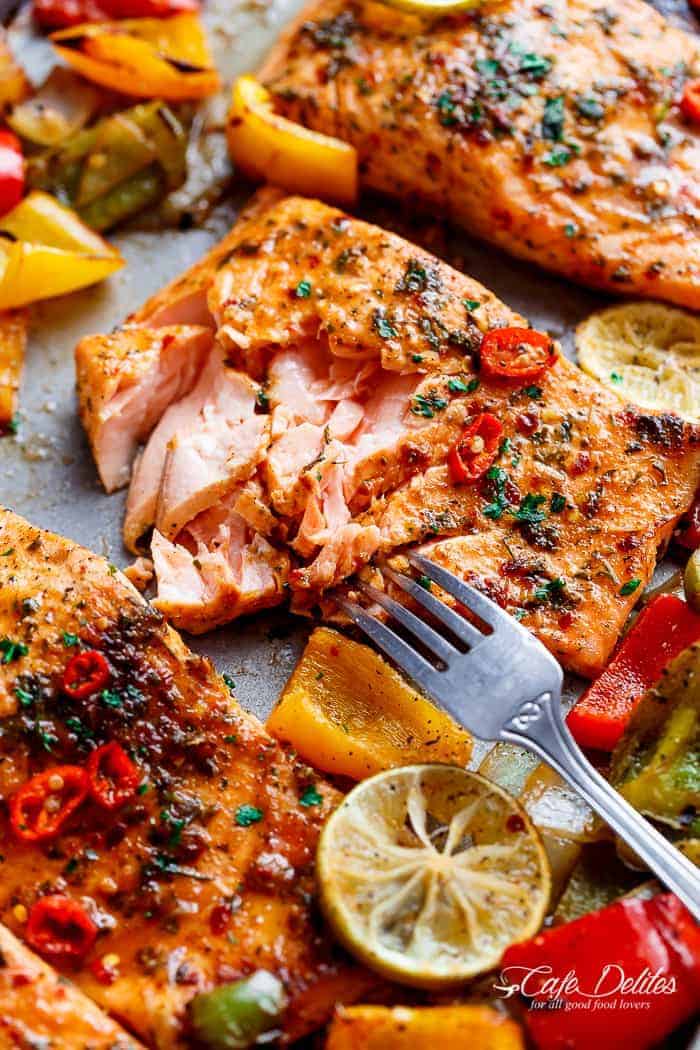 Sheet Pan Chili Lime Salmon with Fajita flavours, and a charred, crispy roasted trio of peppers for an easy and healthy weeknight meal! | https://cafedelites.com