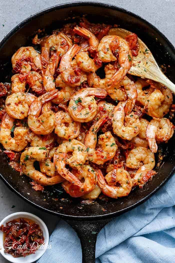 This Spicy Garlic Sun Dried Tomato Shrimp recipe came and knocked me over the head while I Spicy Garlic Sun Dried Tomato Shrimp