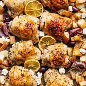 Greek Chicken And Potatoes on a baking tray