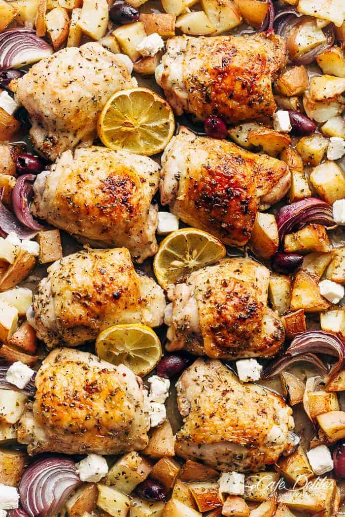 Weeknight dinner made simple with Greek baked chicken and potatoes. So many flavours happening in one pan and dinner is ready in less than 45 minutes! | https://cafedelites.com