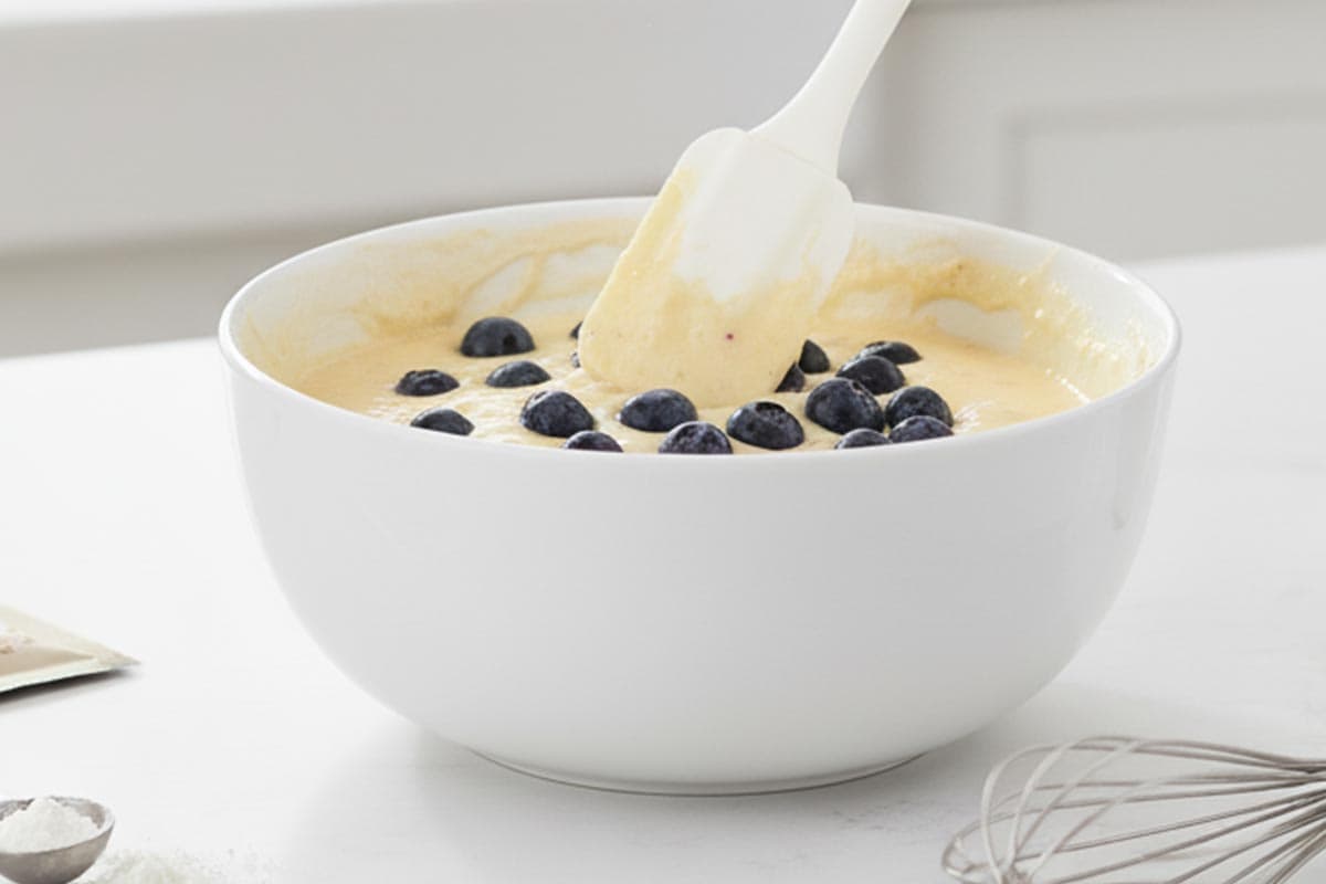 Added the blueberries in the bowl.