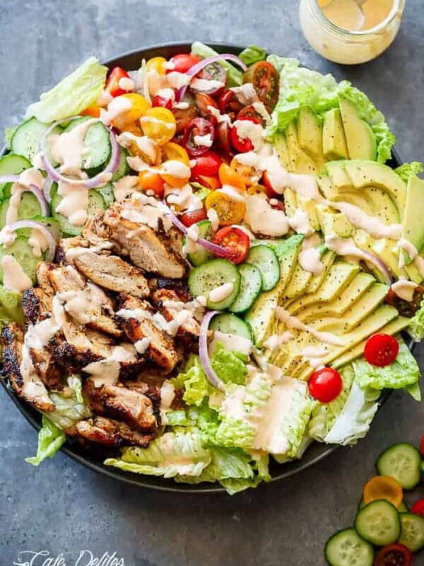 Grilled Cajun Chicken Salad with Creamy Cajun Dressing on a platter