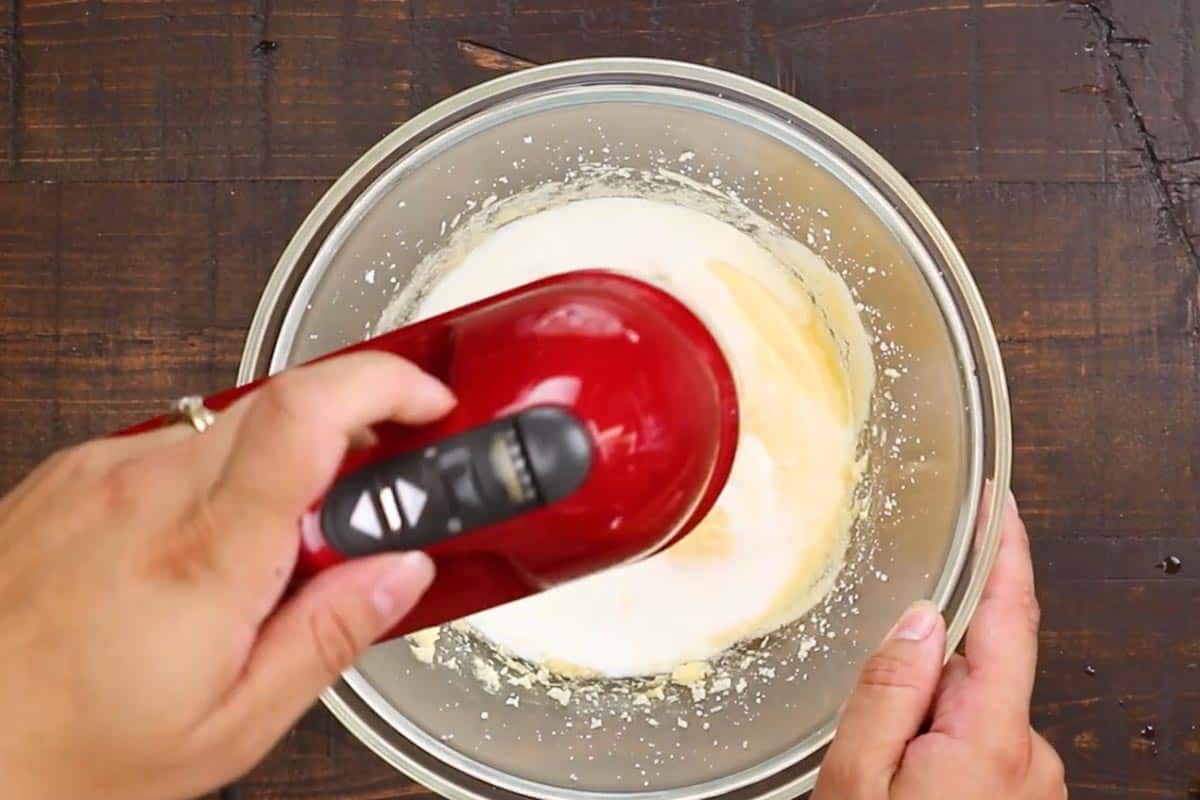 Beating together the butter and sugar In a large bowl. - 4