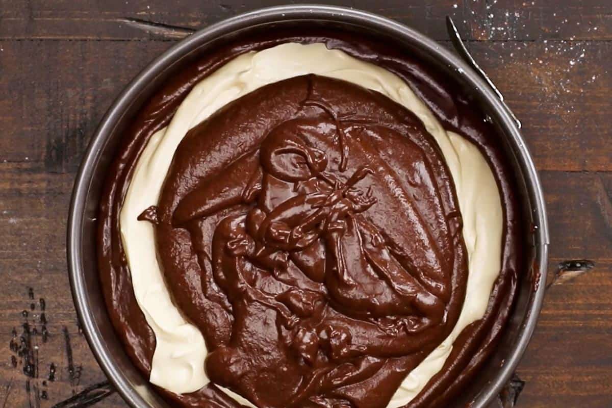 Layering the batter in the pan. - 7