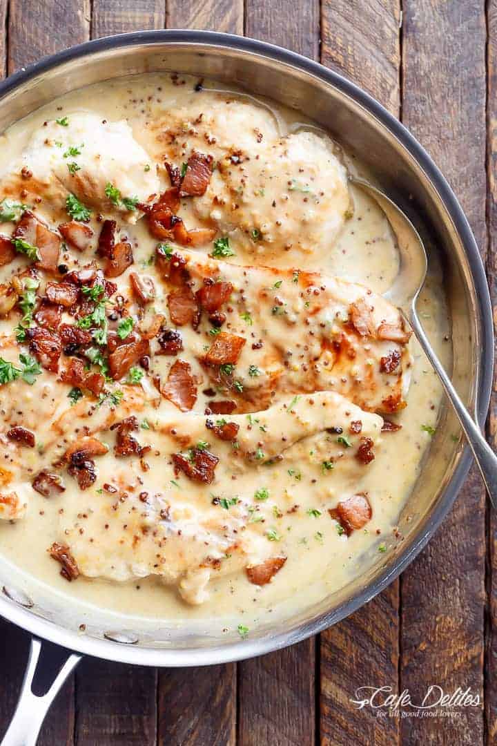 A deliciously Creamy Honey Mustard Chicken with crispy bacon pieces will become your new favourite dinner -- flour less and low carb WITH dairy free options! | https://cafedelites.com