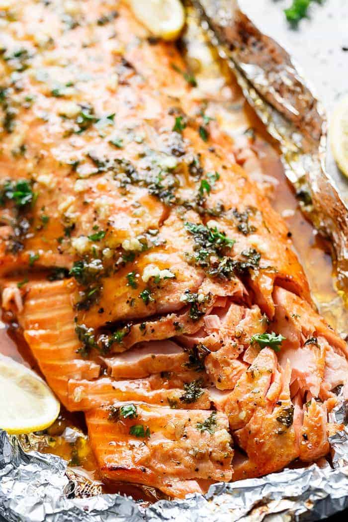 Honey Garlic Butter Salmon In Foil in under 20 minutes, then broiled (or grilled) for that extra golden, crispy and caramelised finish! So simple and only 4 main ingredients, with no mess to clean up! | https://cafedelites.com