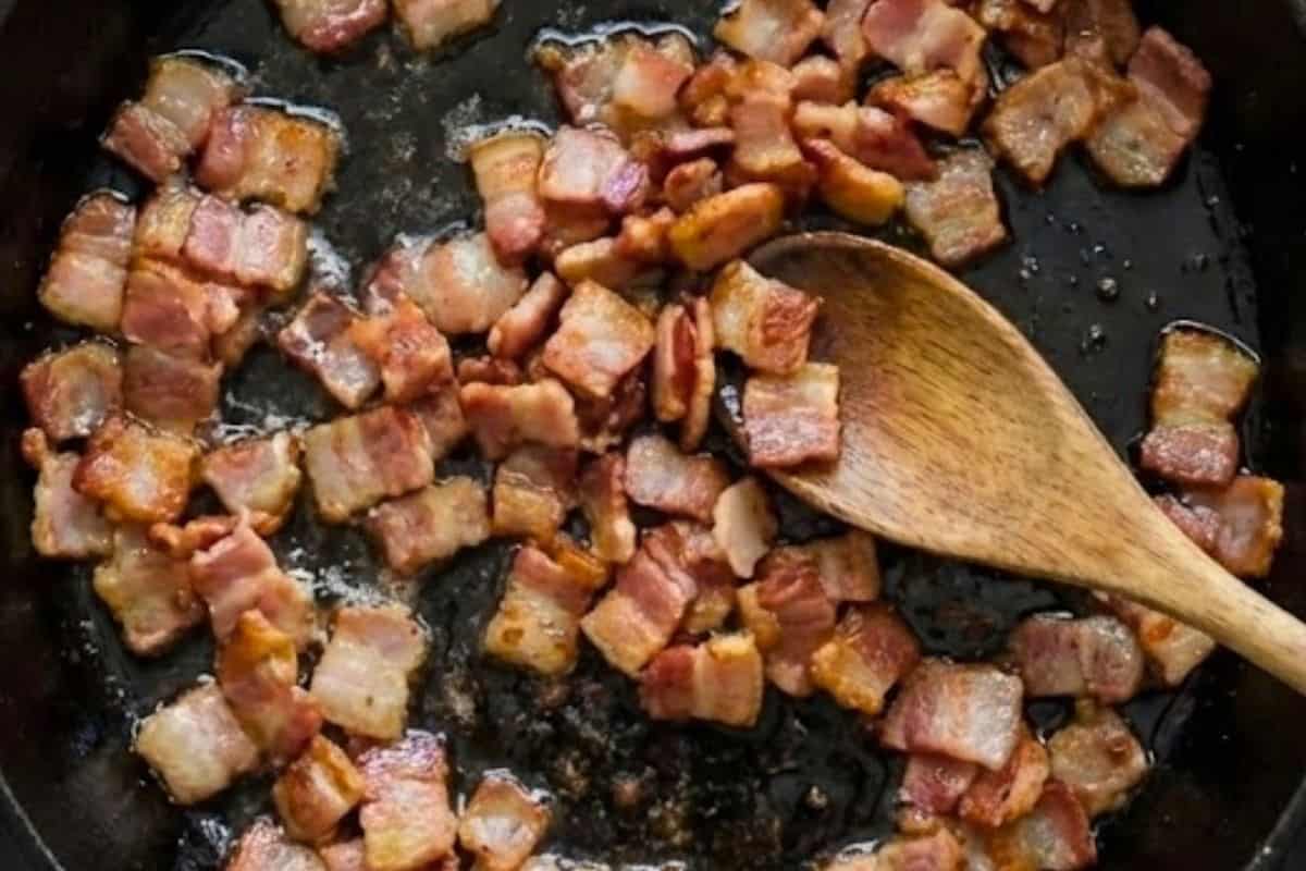 Heat a grill pan or skillet over medium heat with a small drizzle of olive oil. Cook the diced bacon until golden and crispy. - 5
