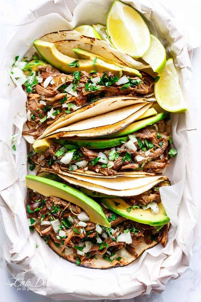 Slow Cooker Barbacoa Short Ribs full of barbacoa flavours! Meat so tender it falls off the bone before being stuffed into Taco's and served with Avocado! | http://cafedelites.com