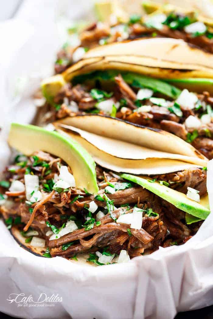 Slow Cooker Barbacoa Short Ribs full of barbacoa flavours! Meat so tender it falls off the bone before being stuffed into Taco's and served with Avocado! | https://cafedelites.com