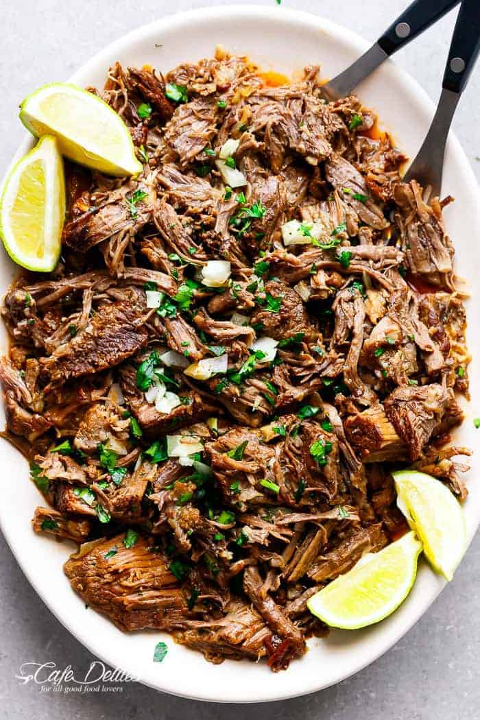 Slow Cooker Barbacoa Short Ribs full of barbacoa flavours! Meat so tender it falls off the bone before being stuffed into Taco's and served with Avocado! | http://cafedelites.com