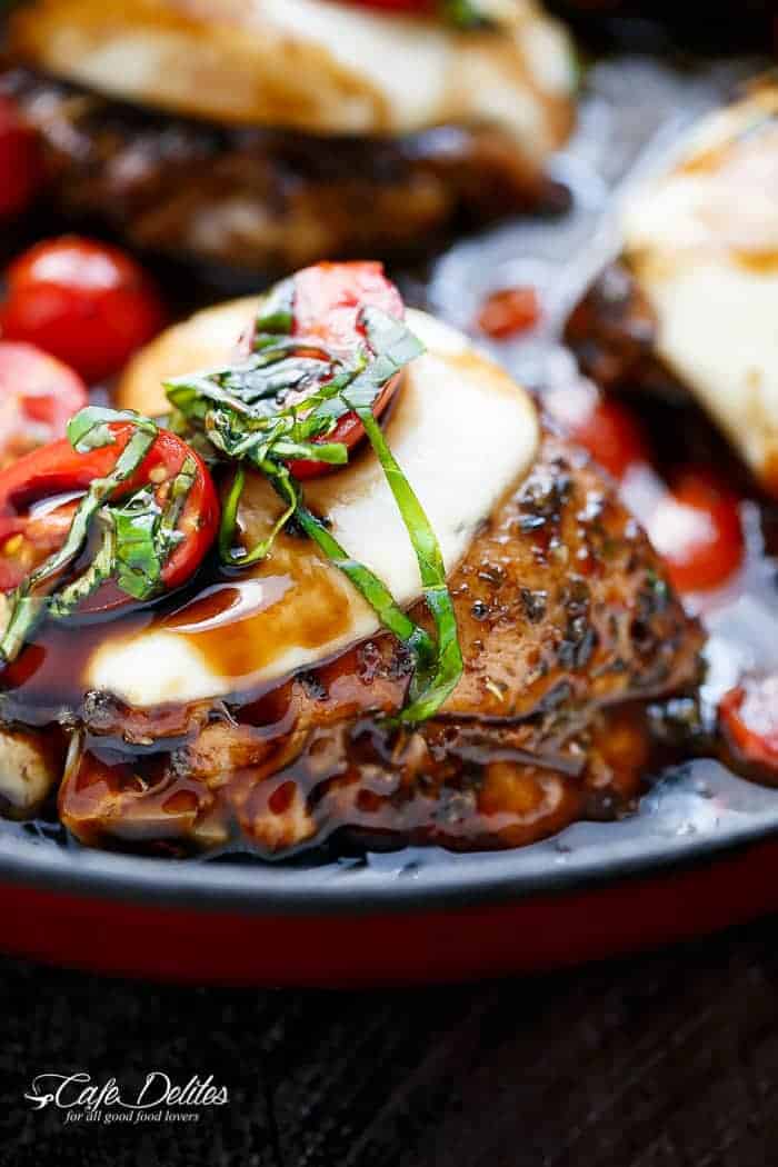 Caprese Chicken cooked right in a sweet, garlic balsamic glaze with juicy cherry tomatoes, fresh basil and topped with melted mozzarella cheese! | cafedelites.com