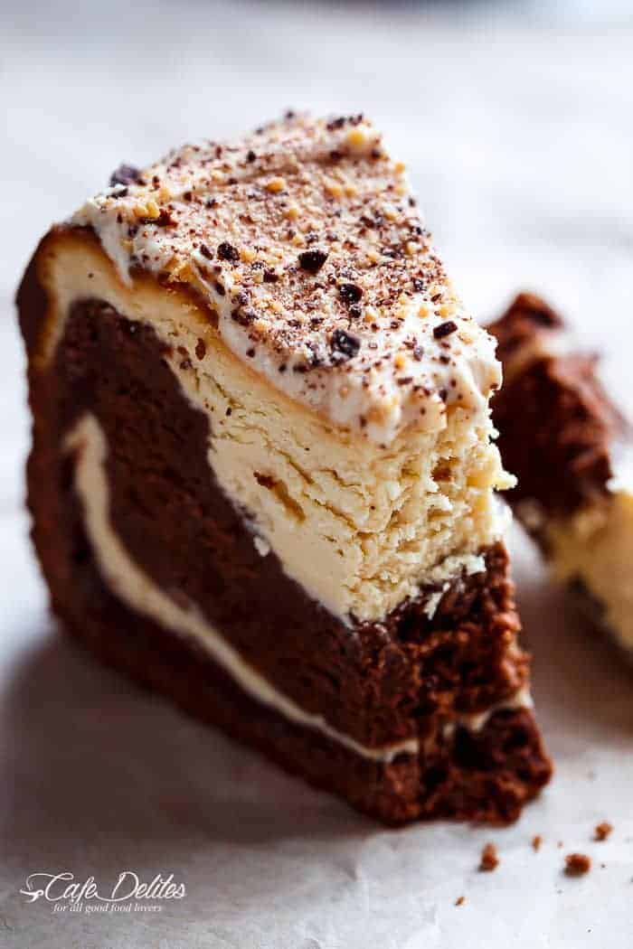Chocolate Peanut Butter Cheesecake Cake made in the ONE pan! Creamy peanut butter cheesecake bakes on top of a fudgy chocolate cake for the ultimate dessert! | https://cafedelites.com