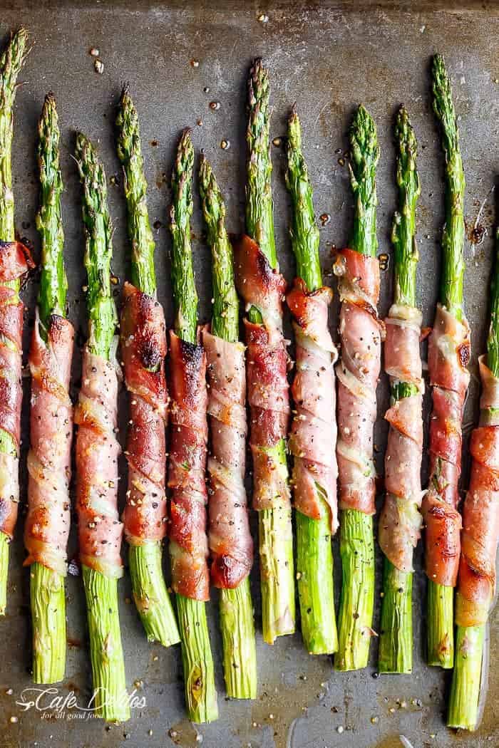 Garlic Butter Prosciutto Wrapped Asparagus are simple and quick to make. The ultimate finger food, side dish or appetiser! | https://cafedelites.com