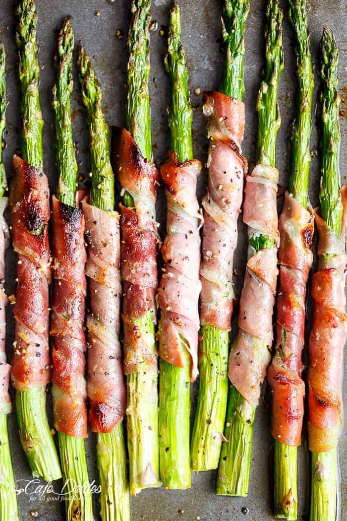 Garlic Butter Prosciutto Wrapped Asparagus are simple and quick to make. The ultimate finger food, side dish or appetiser! | https://cafedelites.com