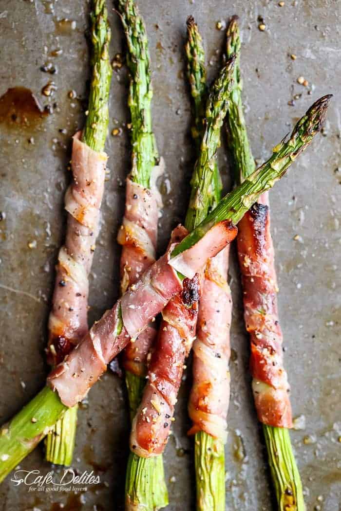 Garlic Butter Prosciutto Wrapped Asparagus | https://cafedelites.com