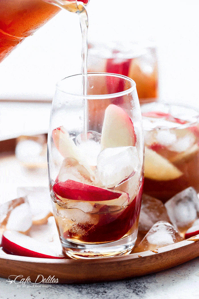 A simple fresh and homemade white peach iced tea that's better than any store bought iced tea and so addictive it will become your new favourite drink!