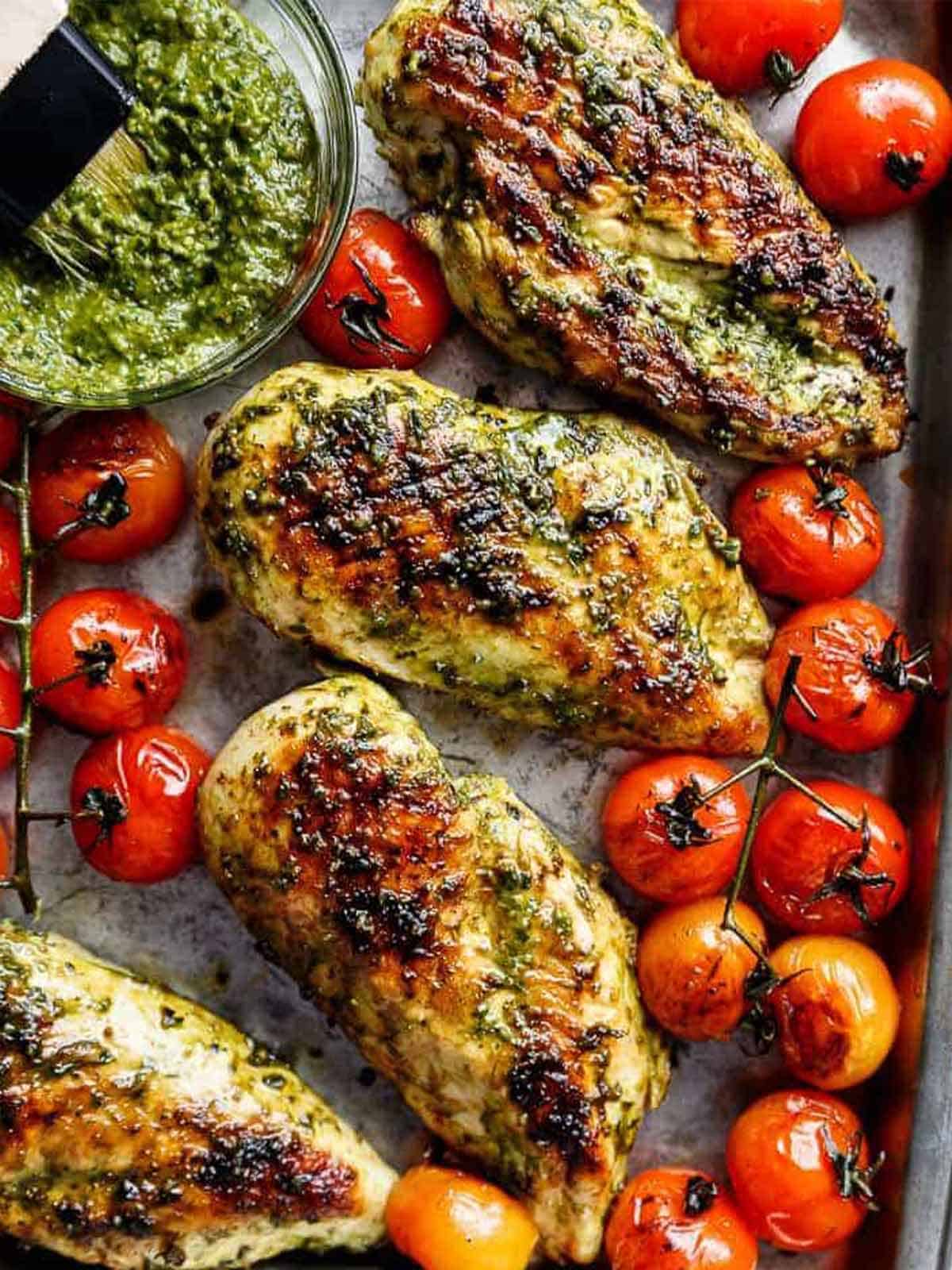 Pesto Chicken GRILLED OR OVEN BAKED, smothered in a creamy, homemade Basil Pesto!