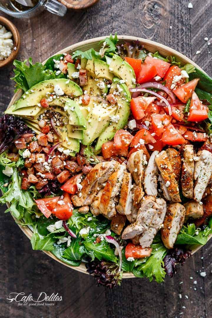 BLT Balsamic Chicken Avocado Feta Salad is a delicious twist to a BLT in a bowl, with a balsamic dressing that doubles as a marinade! You won't even miss the bread in this mega loaded salad. | http://cafedelites.com