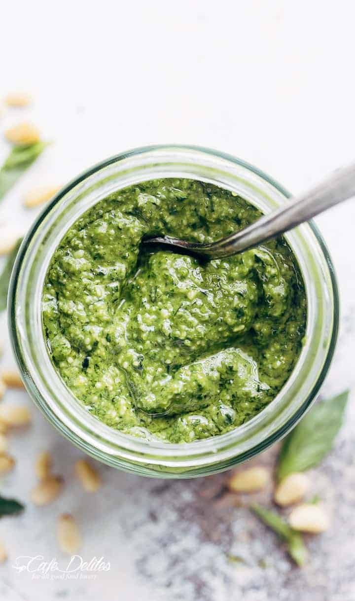 Fresh, homemade basil pesto is way better than any store bought pesto, with a flavour-packed punch! All you need is 5 ingredients and a food processor! | https://cafedelites.com
