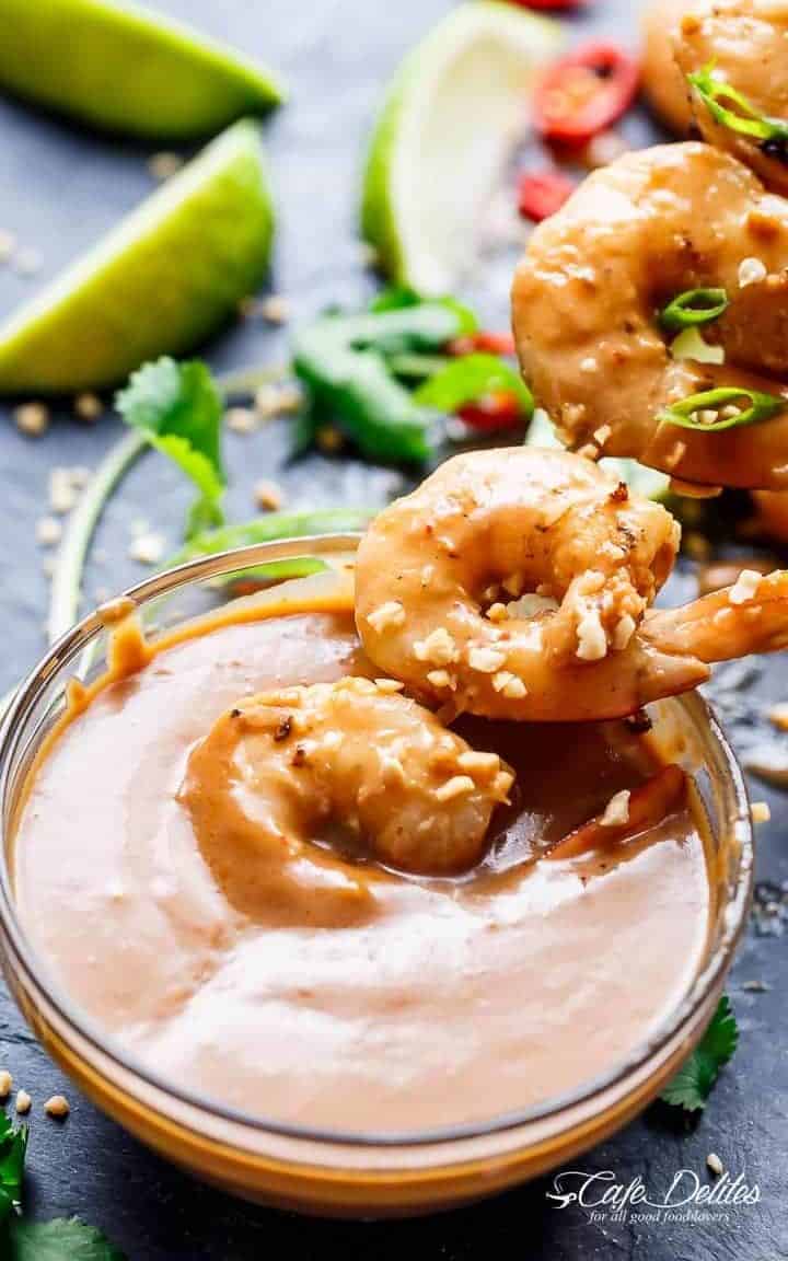 Easy grilled Satay Shrimp Skewers smothered in the BEST 10 minute Thai-style peanut sauce with minimal effort and maximum taste! | https://cafedelites.com