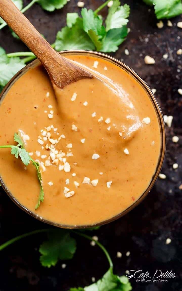 An Easy Satay Dipping Sauce, using simple ingredients and ready in less than 5 minutes! Pour it over chicken or seafood, or beef for Satay right at home! | https://cafedelites.com
