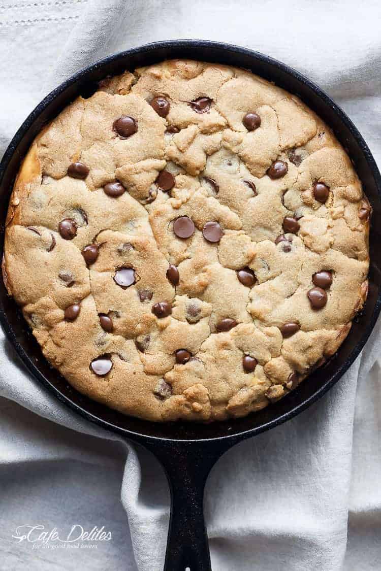 Cheesecake Stuffed Chocolate Chip Skillet Cookie | https://cafedelites.com