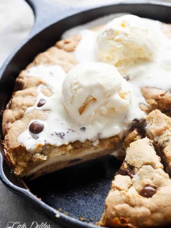 Cheesecake Stuffed Skillet Cookie with ice cream scoop on top