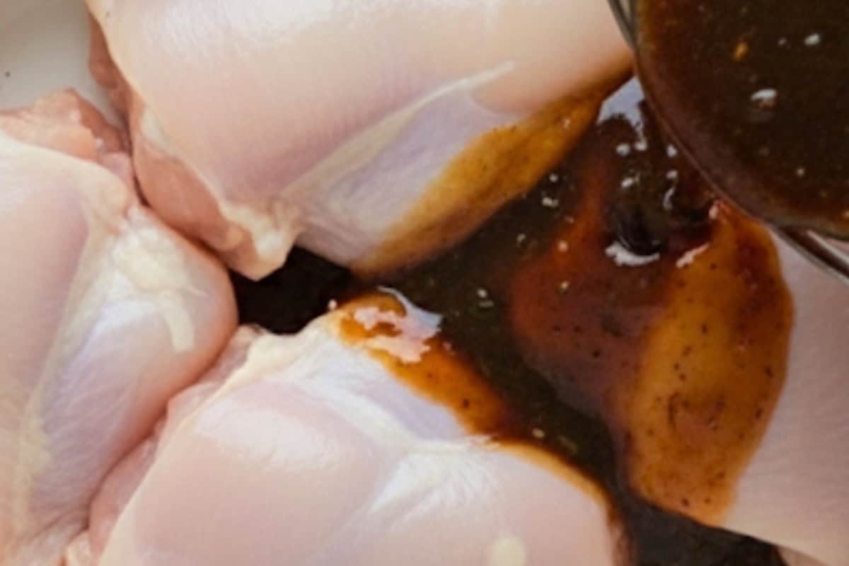 Pour 4 tablespoons of the marinade over the chicken in a shallow dish.