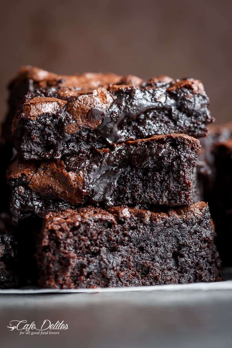 The Best, Fudgy ONE BOWL Cocoa Brownies! A special addition gives these brownies a super fudgy centre without losing that crispy, crackly top! | https://cafedelites.com