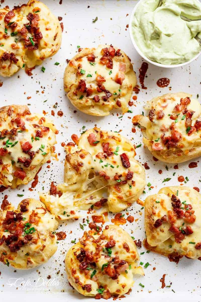 Crispy and Loaded Cheesy Bacon Smashed Potatoes with Chives and an Avocado Crema Cheesy Bacon Smashed Potatoes