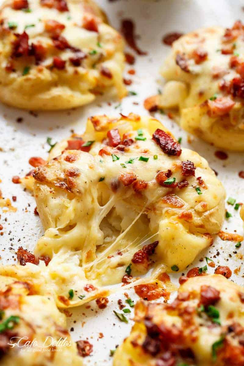 Crispy and Loaded Cheesy Bacon Smashed Potatoes with Chives and an Avocado Crema Cheesy Bacon Smashed Potatoes