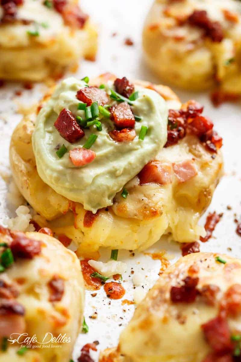 Crispy and Loaded Cheesy Bacon Smashed Potatoes with Chives and an Avocado Crema Cheesy Bacon Smashed Potatoes