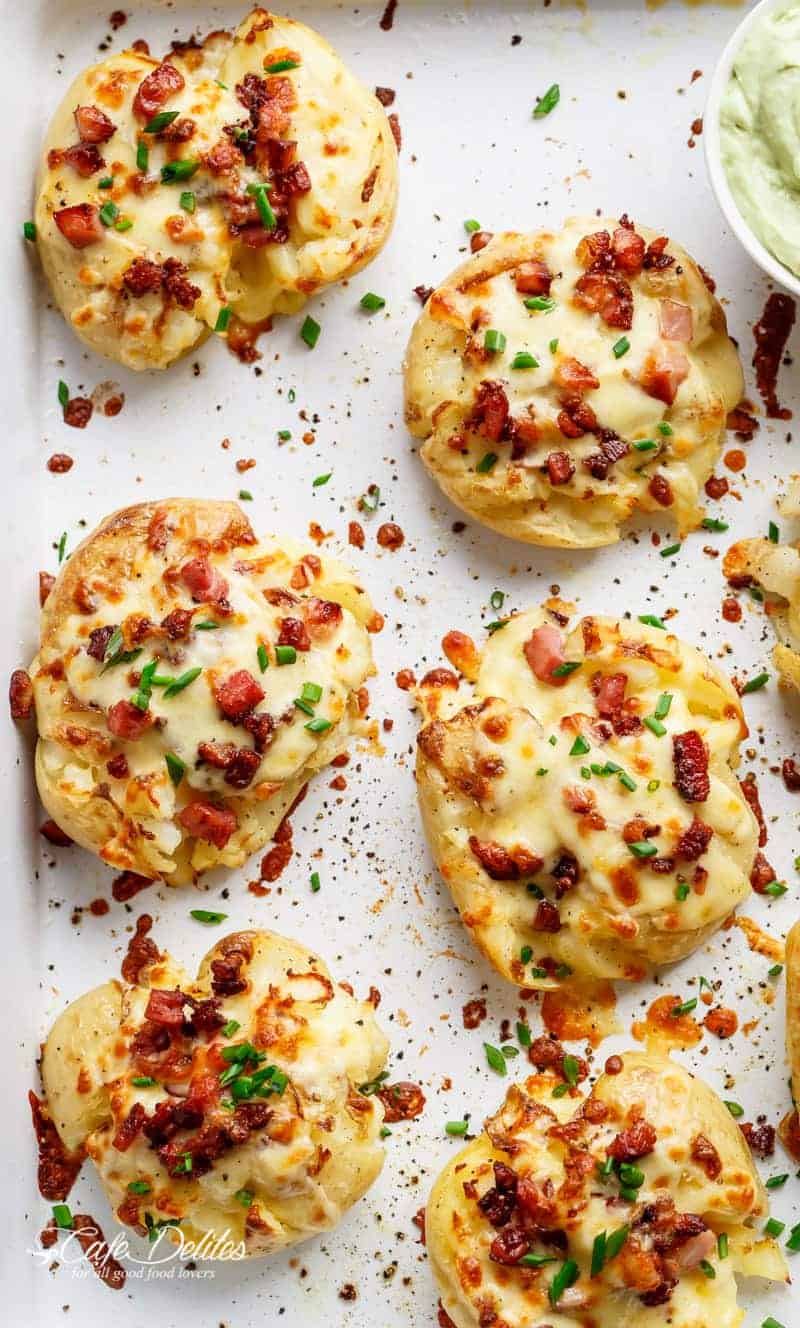 Crispy and Loaded Cheesy Bacon Smashed Potatoes with Chives and an Avocado Crema Cheesy Bacon Smashed Potatoes