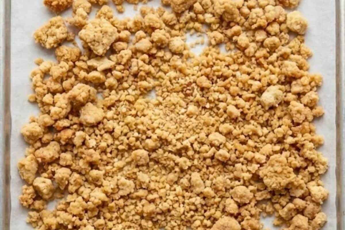 Spread crumbs evenly onto the prepared tray and bake for 10 minutes.  - 5