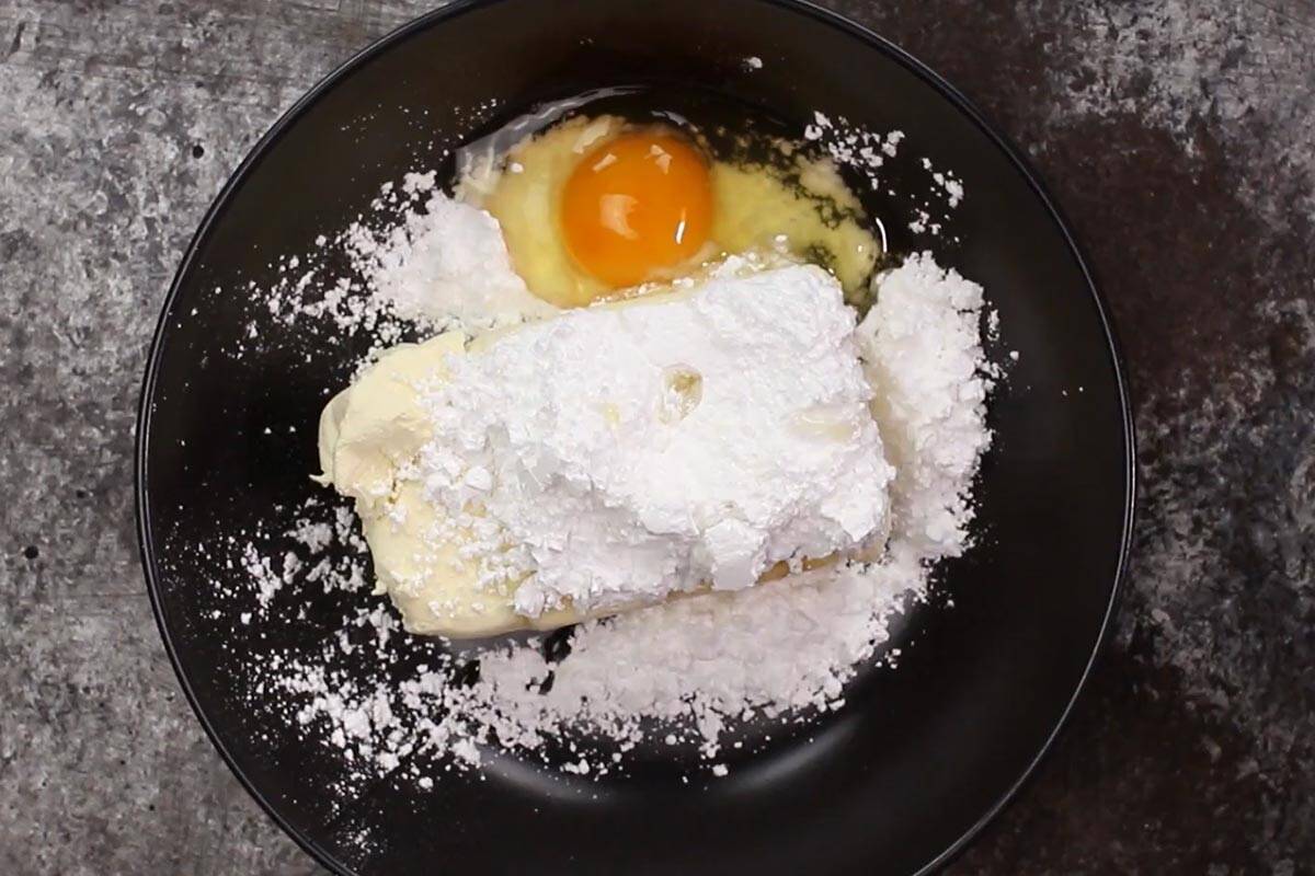 Cream cheese, sweetener or sugar, egg, and vanilla in a bowl. - 4