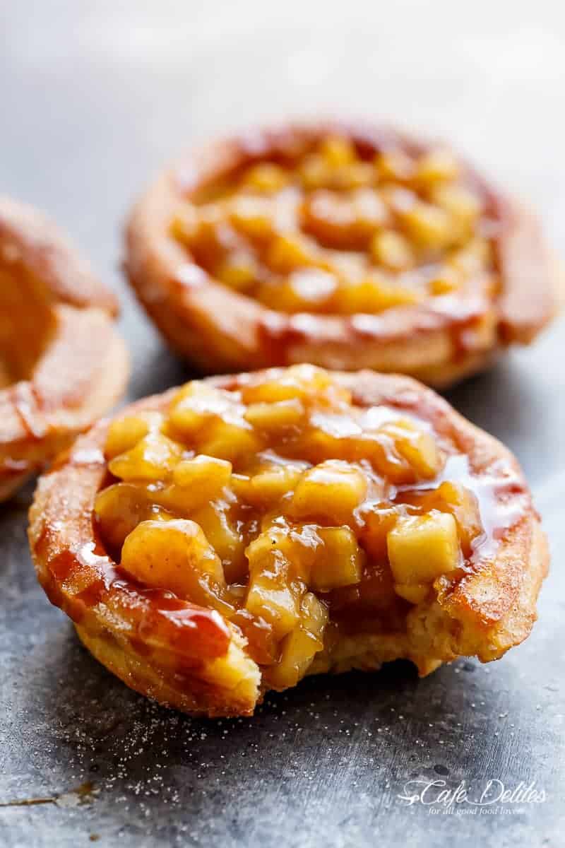 The ultimate pie! CHURRO Apple Pies: where TWO desserts become one! Apple pie filling is served in Churro bowls instead of the traditional pie pastry, and drizzled with an easy, homemade caramel sauce, to make the most incredible dessert! | https://cafedelites.com